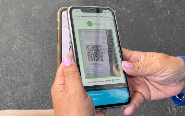 check-in phone scanning digital ticket